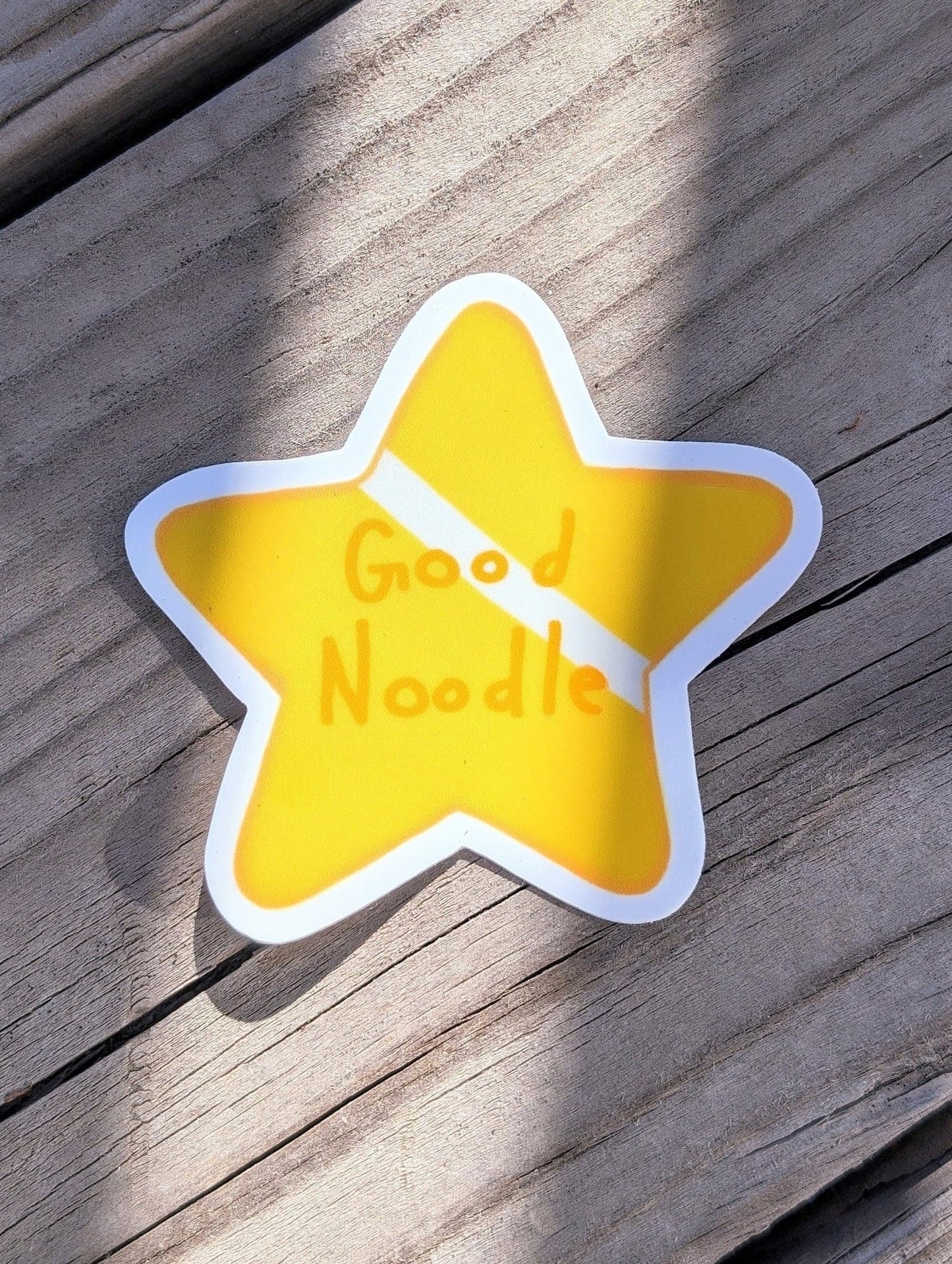 gold star sticker that says good noodle